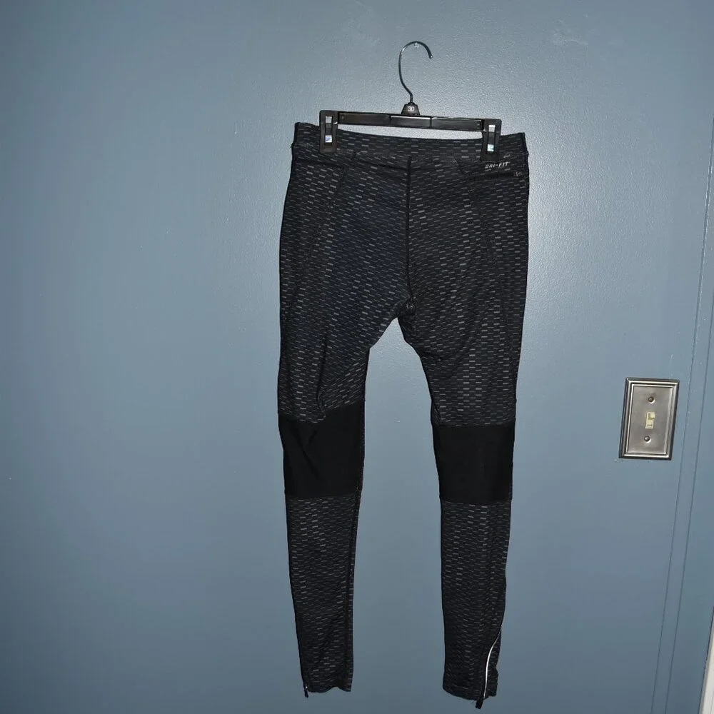 Nike Dri-Fit running tights size Small‎